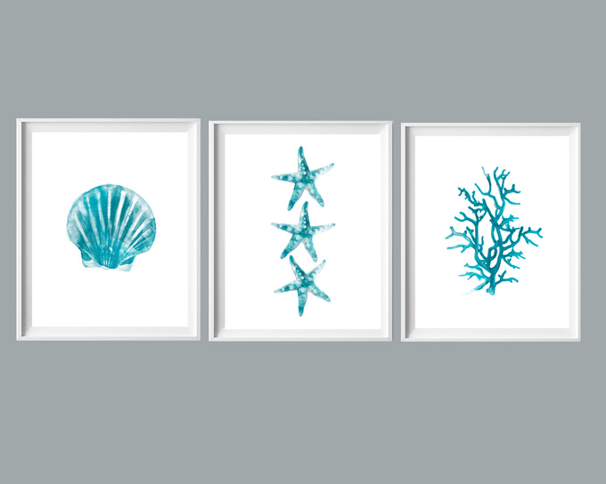 three framed blue wall art