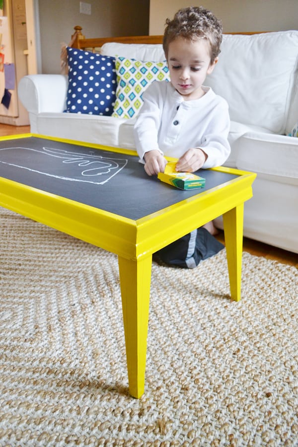 boy drawing on table